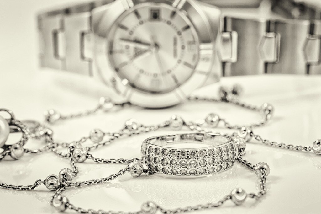 Silver ring, necklace, and watch