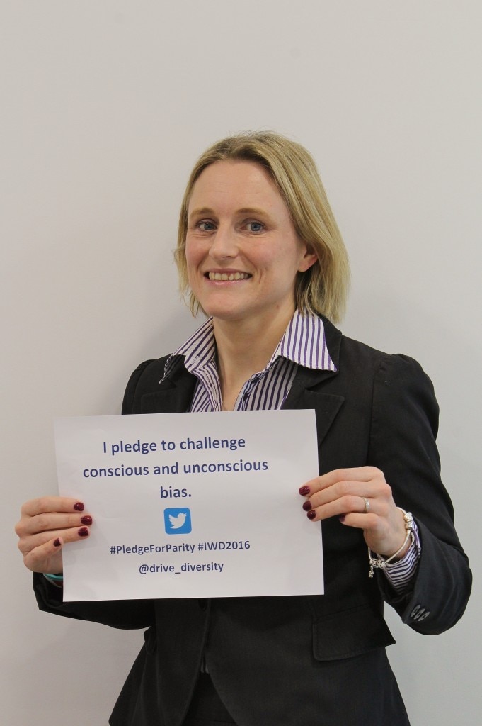 Jo Vickers holding a certificate