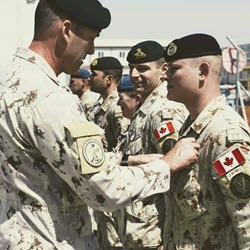 Kyle getting pinned for the Canadian Armed Forces